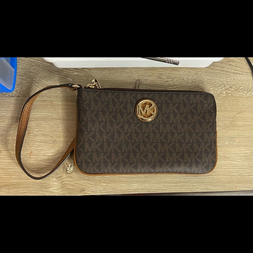 Micheal Kors hand wallet.